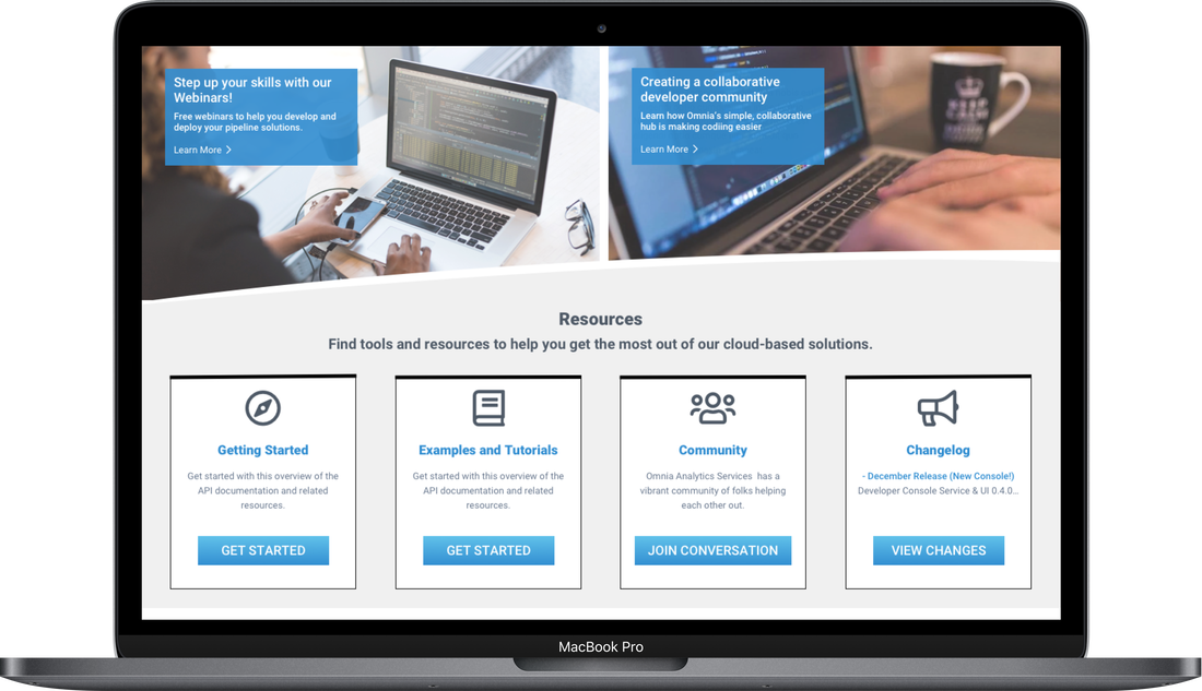 Released Omnia desktop console on a laptop: webinar and community banners above a Resources section with Getting Started, Examples and Tutorials, Community and Changelog cards